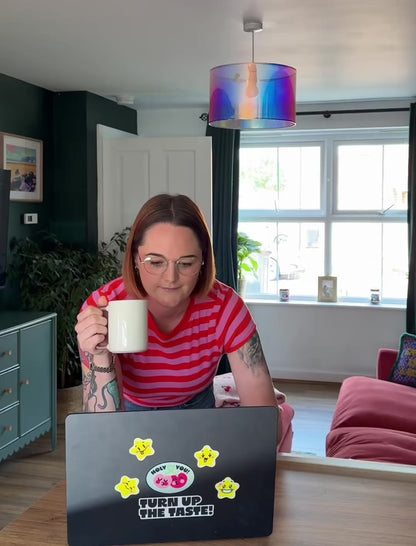 Woman working from home and then upgrading her cat litter set up with the taking care of business bundle.