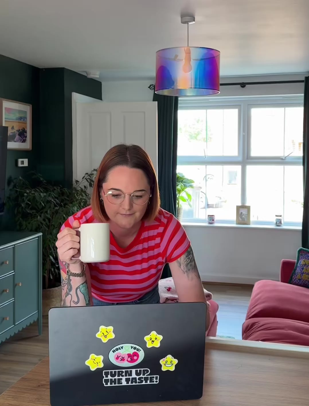 Woman working from home and then upgrading her cat litter set up with the taking care of business bundle.