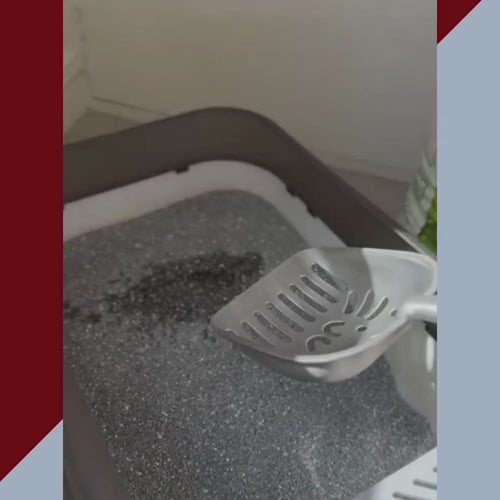 Video of a person removing a clump of our Our Odour-Locking Litter (G225) from one of our trays. 